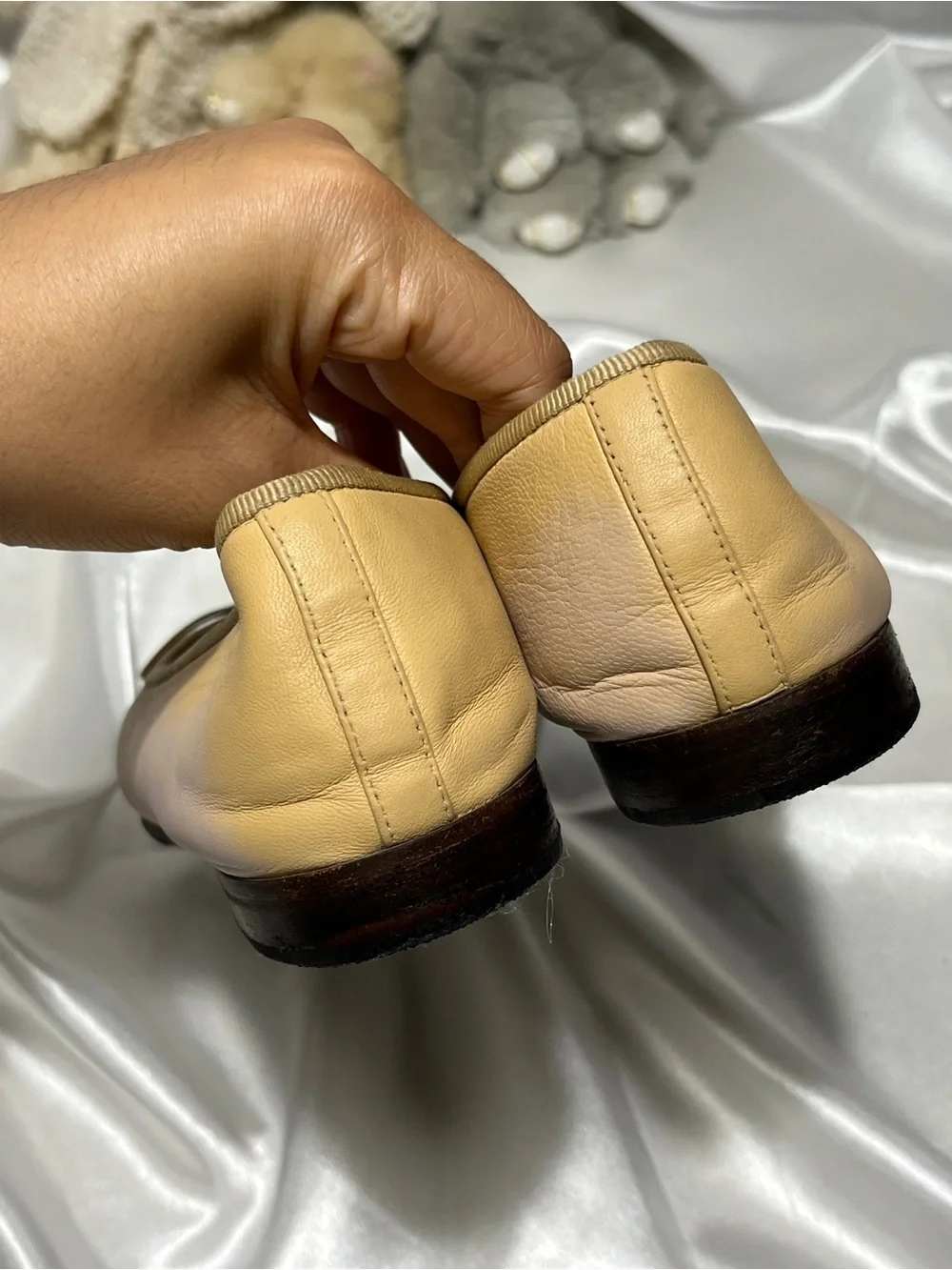 CHANEL Beige Leather Ballet Flats with Black Cap Toe and CC Logo